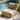 Beige loungestoel Mr. Lounge Copa naast een zwembad in de zon